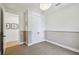 Bedroom with neutral paint, carpet, closet doors and modern lighting at 411 W Frances Ave # 2, Tampa, FL 33602