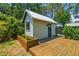 Charming backyard cottage with a wooden deck and flower box at 411 W Frances Ave # 2, Tampa, FL 33602