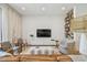 Relaxing living room with comfortable seating, built-in shelving, and modern decor at 411 W Frances Ave # 2, Tampa, FL 33602
