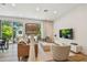 Stylish living room with hardwood floors, large sliding doors to outdoor space, and contemporary furnishings at 411 W Frances Ave # 2, Tampa, FL 33602