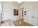 Minimalist home office with hardwood floors, natural light, and simple decor, perfect for a focused work environment at 411 W Frances Ave # 2, Tampa, FL 33602