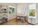 Bright home office with natural light, built-in shelving, and modern decor, creating a functional workspace at 411 W Frances Ave # 2, Tampa, FL 33602