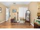 Cozy bedroom featuring wood floors, closet, furnishings, and decor at 4180 Jacaranda Cir, Brooksville, FL 34604
