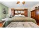 Bedroom featuring a bed with built in headboard and two wooden dressers at 4180 Jacaranda Cir, Brooksville, FL 34604