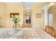 Elegant dining room features charming details and a pass-through to other rooms at 4180 Jacaranda Cir, Brooksville, FL 34604