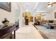 Foyer with tiled floor and an open view of the living room at 4180 Jacaranda Cir, Brooksville, FL 34604