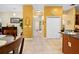 Hallway with tile flooring, white doors, recessed lighting, and access to other rooms at 4180 Jacaranda Cir, Brooksville, FL 34604