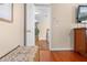 Hallway with doorway leading to a staircase at 4180 Jacaranda Cir, Brooksville, FL 34604