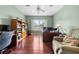 Home office with a large window, built-in bookcase, and a spacious desk setup at 4180 Jacaranda Cir, Brooksville, FL 34604