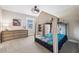 Charming bedroom with canopy bed, wooden dresser, and ceiling fan at 4275 Burdick Loop, Odessa, FL 33556