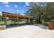 A community pavilion features picnic tables and grilling areas for residents at 4275 Burdick Loop, Odessa, FL 33556