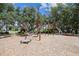 Community playground with climbing structure and slide for recreation and fun at 4275 Burdick Loop, Odessa, FL 33556