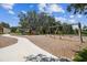 A community playground with swings, a slide, and a mulch ground covering at 4275 Burdick Loop, Odessa, FL 33556