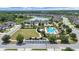 Wonderful aerial view of the community pool, green spaces and surrounding neighborhood at 4300 Barletta Ct, Wesley Chapel, FL 33543