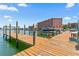 Community dock offering convenient boat access and serene waterfront views at 445 Hamden Dr # 502, Clearwater Beach, FL 33767