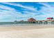 Picturesque pier extending over the ocean, offering stunning views and a perfect spot for a stroll at 445 Hamden Dr # 502, Clearwater Beach, FL 33767