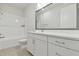 Modern bathroom showcasing a shower-tub, stylish vanity and a mirror at 4717 W Mccoy St # 2, Tampa, FL 33616