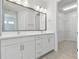 Bright bathroom features double vanity, walk-in closet, and stylish tile flooring at 4717 W Mccoy St # 2, Tampa, FL 33616