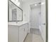 Bathroom featuring a vanity and modern tile flooring at 4717 W Mccoy St # 2, Tampa, FL 33616