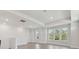 Spacious living room with light-toned wood flooring with lots of natural light at 4717 W Mccoy St # 2, Tampa, FL 33616