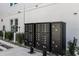 Community mailboxes, building signage, and well-maintained landscaping at 4717 W Mccoy St # 2, Tampa, FL 33616