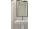 Close up of a powder room featuring a pedestal sink and towel ring at 4717 W Mccoy St # 2, Tampa, FL 33616
