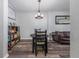 Cozy dining area with a round table and decorative shelving at 4721 W Iowa Ave, Tampa, FL 33616