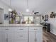 View of the kitchen and living room featuring hardwood floors at 4721 W Iowa Ave, Tampa, FL 33616