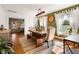 Well-lit dining room features a rustic wood table and decorative light fixture at 4767 6Th N Ave, St Petersburg, FL 33713