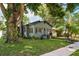 This home boasts lush greenery and a well-kept lawn, creating a serene and inviting outdoor space at 4767 6Th N Ave, St Petersburg, FL 33713