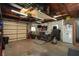 Spacious garage with concrete walls, white appliances, and tools/equipment at 4767 6Th N Ave, St Petersburg, FL 33713