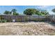 Fenced backyard offers privacy and space for outdoor enjoyment with potential for landscaping and recreational use at 5004 Suwannee Dr, New Port Richey, FL 34652
