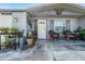 Welcoming front porch with comfortable seating and stylish decorative accents at 5004 Suwannee Dr, New Port Richey, FL 34652