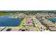 Aerial view of the home, showcasing its location near the lake and within a well-maintained neighborhood at 5208 Dandelion St, Apollo Beach, FL 33572