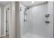 Bathroom features a glass enclosed shower with white subway tile at 5208 Dandelion St, Apollo Beach, FL 33572