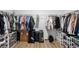 Walk-in closet features wire shelving and hardwood floors at 5208 Dandelion St, Apollo Beach, FL 33572