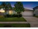 Charming single Gathering home showcasing a well manicured lawn and inviting curb appeal, perfect for families at 5208 Dandelion St, Apollo Beach, FL 33572