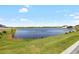 Scenic lake view from the property's vantage point, highlighting the tranquil waterfront setting at 5208 Dandelion St, Apollo Beach, FL 33572
