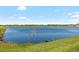 Picturesque lake view showcasing the natural beauty and serene atmosphere of the community at 5208 Dandelion St, Apollo Beach, FL 33572