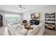 Cozy living room featuring comfortable seating, scenic views, and stylish decor for a relaxing atmosphere at 5208 Dandelion St, Apollo Beach, FL 33572