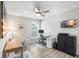 Home office with modern furnishings and a ceiling fan at 5208 Dandelion St, Apollo Beach, FL 33572