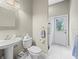 Cozy bathroom with tile floor, walk-in shower and neutral-toned walls at 5216 Kernwood Ct, Palm Harbor, FL 34685