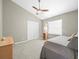 Neutral-toned bedroom featuring bright natural light and closet at 5216 Kernwood Ct, Palm Harbor, FL 34685