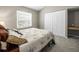 Bedroom featuring a built-in desk and window for natural light at 5216 Kernwood Ct, Palm Harbor, FL 34685