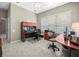 Bright office space with neutral carpeting and multiple workstations at 5216 Kernwood Ct, Palm Harbor, FL 34685