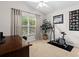 Bedroom featuring neutral carpet, a vaulted ceiling with ceiling fan, and an exercise machine at 5520 Terrain De Golf Dr, Lutz, FL 33558