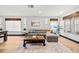 Comfortable Living Room with modern decor, a cozy sofa, and stylish accents at 616 Wheaton Trent Pl, Tampa, FL 33619
