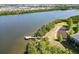 Aerial view of waterfront property with private dock at 616 Wheaton Trent Pl, Tampa, FL 33619
