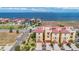 Beautiful aerial view of the coast and townhouses with red roofs and palm trees at 6404 Mayra Shores Ln, Apollo Beach, FL 33572