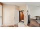 Inviting foyer featuring an elevator with wood paneling for convenient access to all levels of the home at 6404 Mayra Shores Ln, Apollo Beach, FL 33572